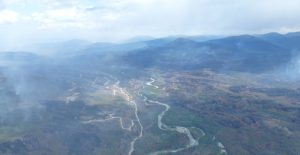 aerial view of smoke and burned area