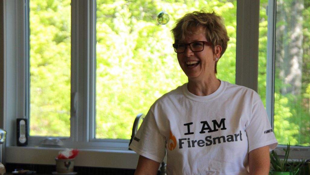 woman wearing FireSmart shirt